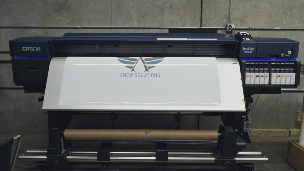 A custom paint wrap for a truck undergoing upfitting services.

